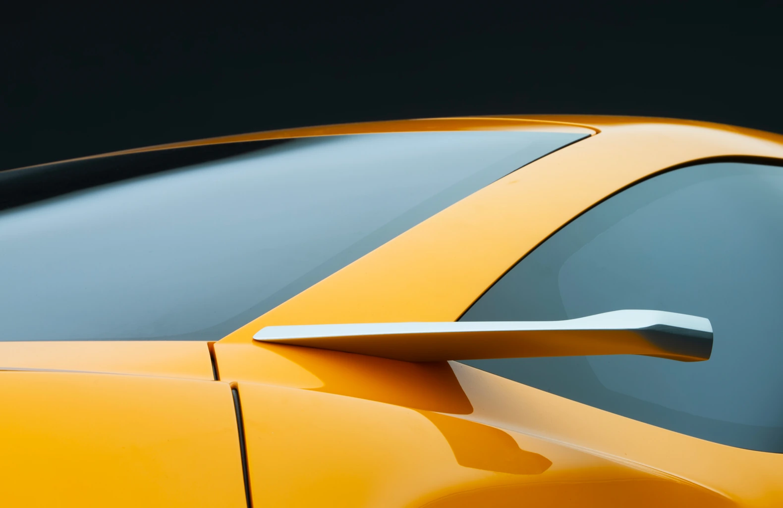Door mirror on a slim stalk against the side glass